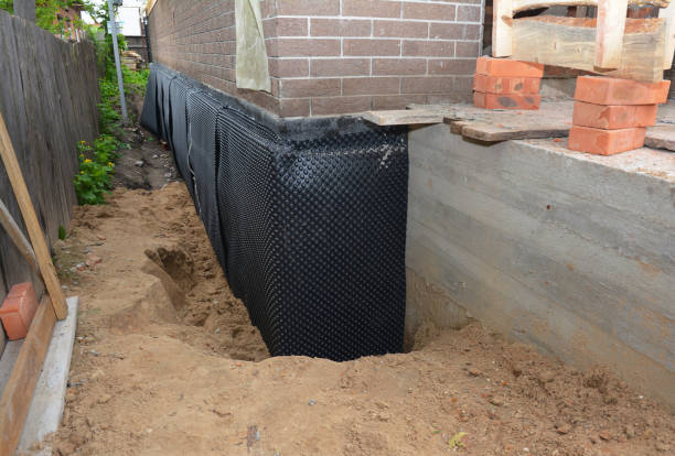 SJ Waterproofing Pros technician performing targeted Emergency Waterproofing assessment in Levittown, PA